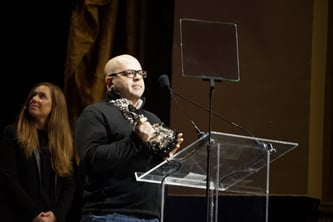 Twilio's Jeff Lawson on-stage at the 2017 TechCrunch Crunchies accepting the award for Founder of the Year